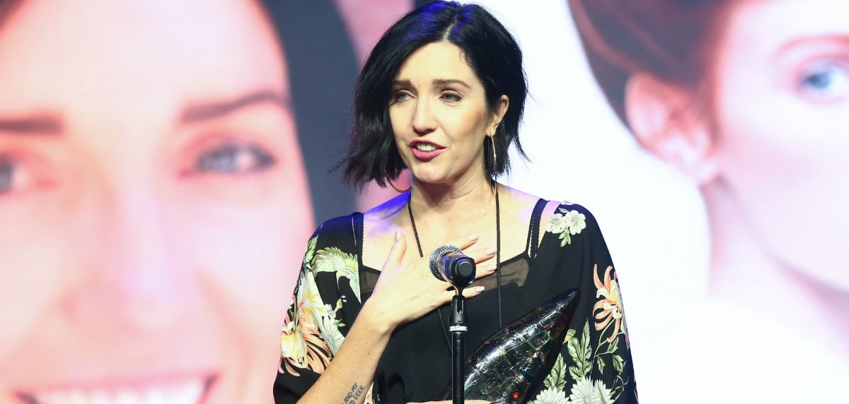 Aisling Campbell accepting NAHA student hairstylist of the year 2017.