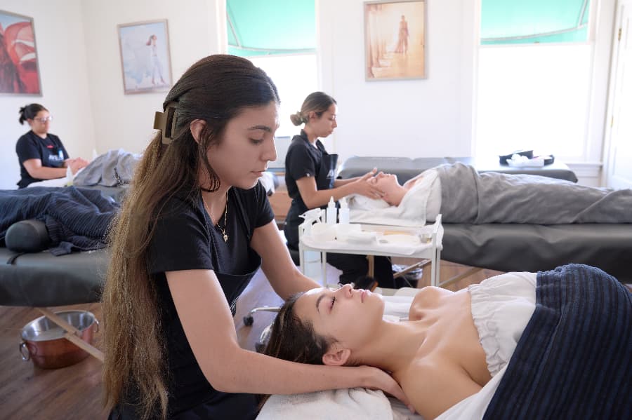 aveda institute student in arizona training to be a massage therapist