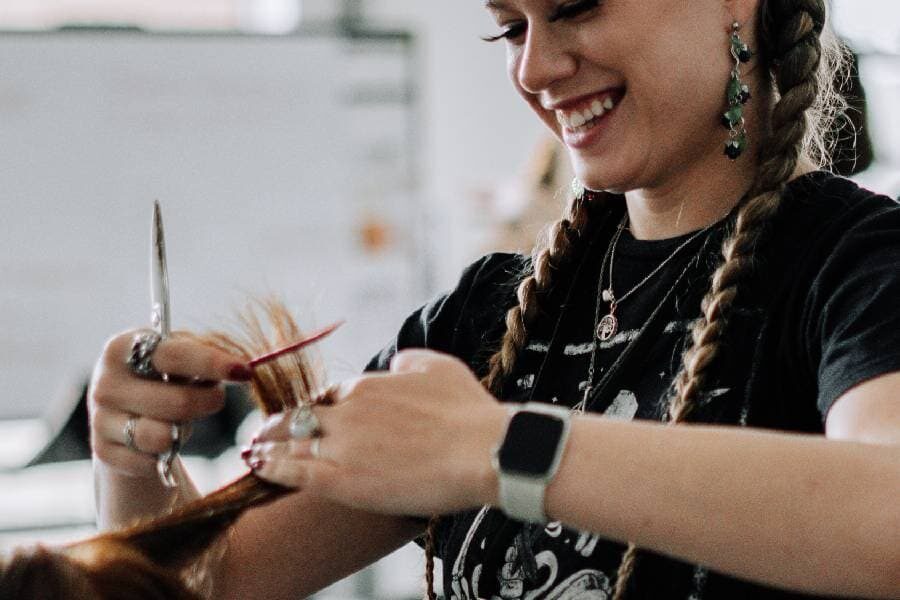 cosmetology student training at aveda institute avondale arizona