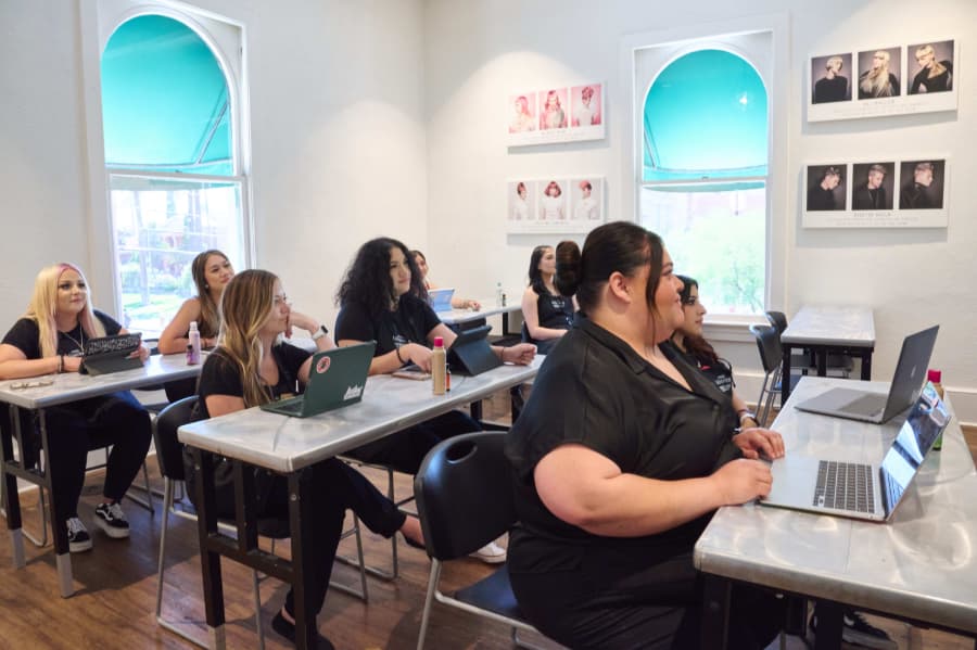 Esthetician students learning at Aveda institutes