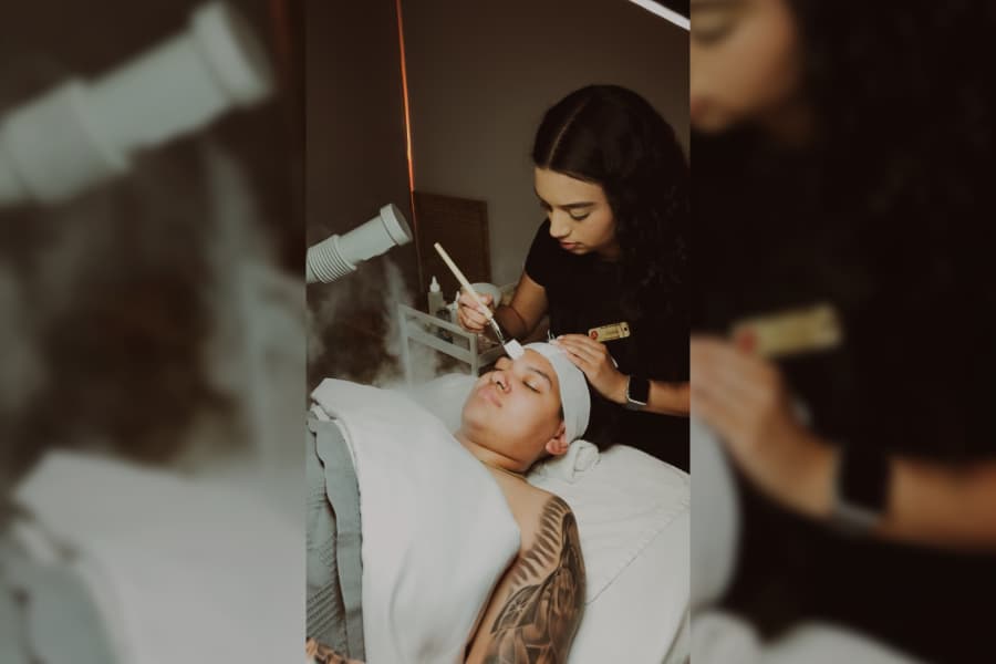 esthetician professional providing facial treatment